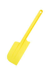 Yellow plastic spatula isolated on white background