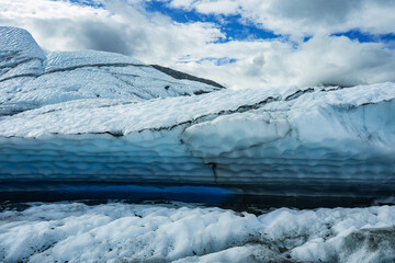 gorgeous blue ice texture on top of glacier
