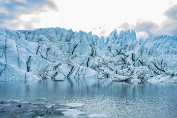 beautiful view on melting glacier blue ice