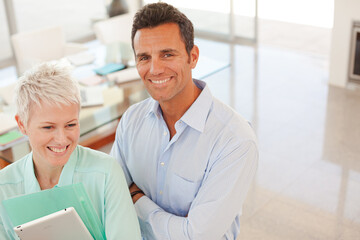 Business people smiling in office