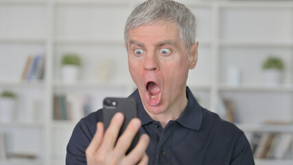 Middle Aged Man Shocked by Online Loss