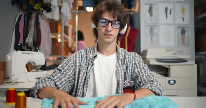 Fashion designer discuss textile in video conference call