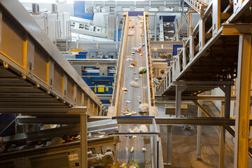 Recycled material on conveyor belt in recycling center