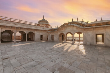 Naklejka premium Agra Fort royal palace with medieval artwork at sunset. Agra Fort is a UNESCO World Heritage site