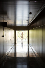 Man standing in corridor
