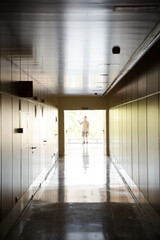 Man standing in corridor