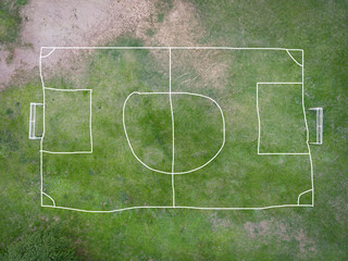 Aerial view field nature green soccer field background, top view football field from above in the...