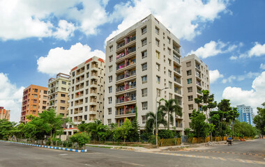 Obraz na płótnie Canvas Residential multistory apartment buildings with city road at Rajarhat area of Kolkata India 