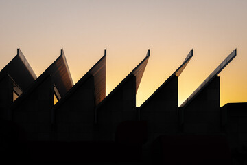 Sunset over architectural silhouette