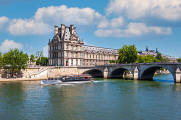 A pleasure boat on the Seine River. Paris, France