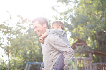 Father and son playing outdoors