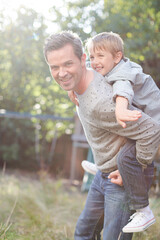 Father and son playing outdoors