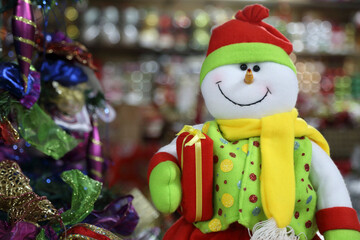 Christmas snowman concept. Snowman in Christmas costume.