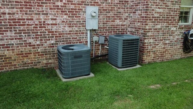 Modern Air Conditioner systems next to home