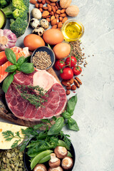 Keto diet food on light gray background.