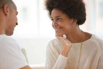 Couple talking indoors