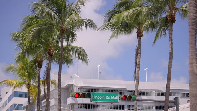 Lincoln Road Mall Miami street sign with palm trees 4k 60fps