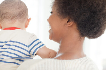 Mother holding baby boy