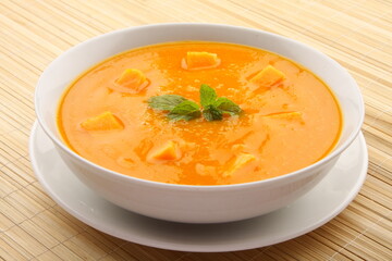 Homemade tasty pumpkin soup - vegan diet meal- traditional recipes background.