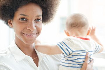 Mother holding baby boy