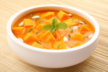 Homemade hot organic pumpkin cream soup.