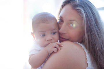 Mother holding baby boy