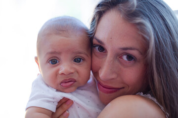 Mother holding baby boy