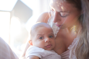 Fototapeta na wymiar Mother holding baby boy