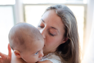Mother holding baby boy