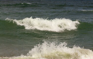 Landscape sea evening at the Baltic Sea, the sun reflects on the waves