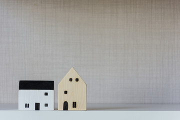 Small wooden toy home on desk,concept,soft focus.