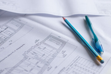 drawings of a construction engineer on a sheet of paper