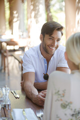 Couple talking in restaurant