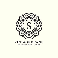 luxurious mandala vintage letter S vector logo design