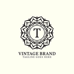 luxurious mandala vintage letter T vector logo design