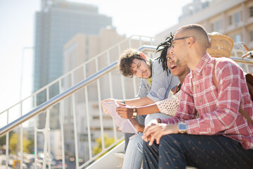 Friends talking on city street