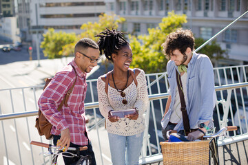 Friends talking on city street