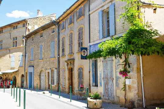 Fototapeta Provencal street with typical houses in southern France, Provence. Aix-en-Provence city on sunny summer day.