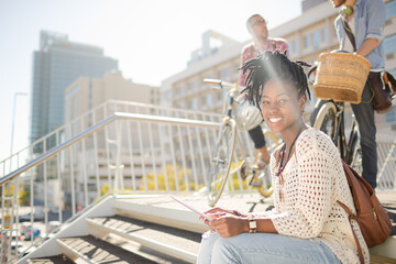 Woman posing with digital tablet