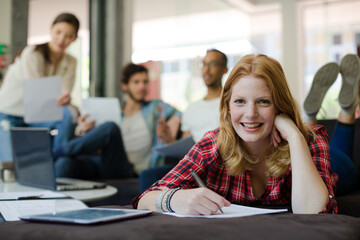 Woman writing in office