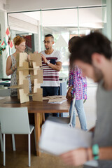 Man reading folders in office
