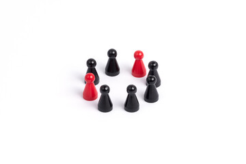 integration, inclusion, diversity, mixed group: red and black play figures in a circle