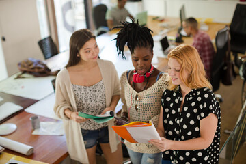 Women talking in office