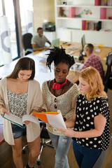 Women talking in office