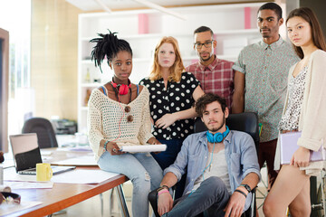 People smiling together in office