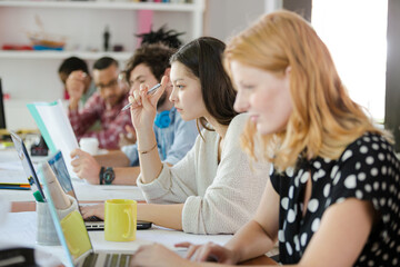 Fototapeta na wymiar People working at conference table in office