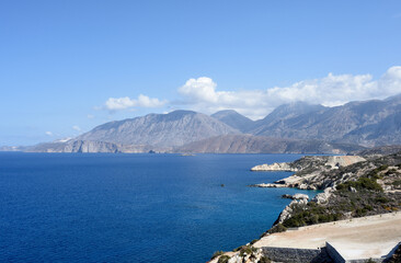 Fototapeta na wymiar Sunny day landscape with sea and mountains near Chania, Crete 
