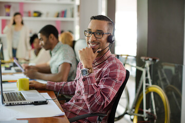 People working at conference table in office