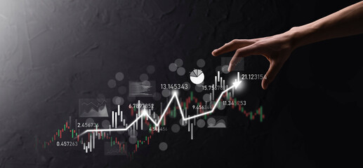 Hand hold sales data and economic growth graph chart. Business planning and strategy. Analysing trading of exchange. Financial and banking. Technology digital marketing.Profit and growing plan.