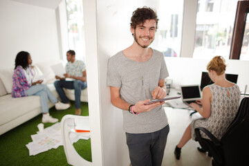 Man using digital tablet in office